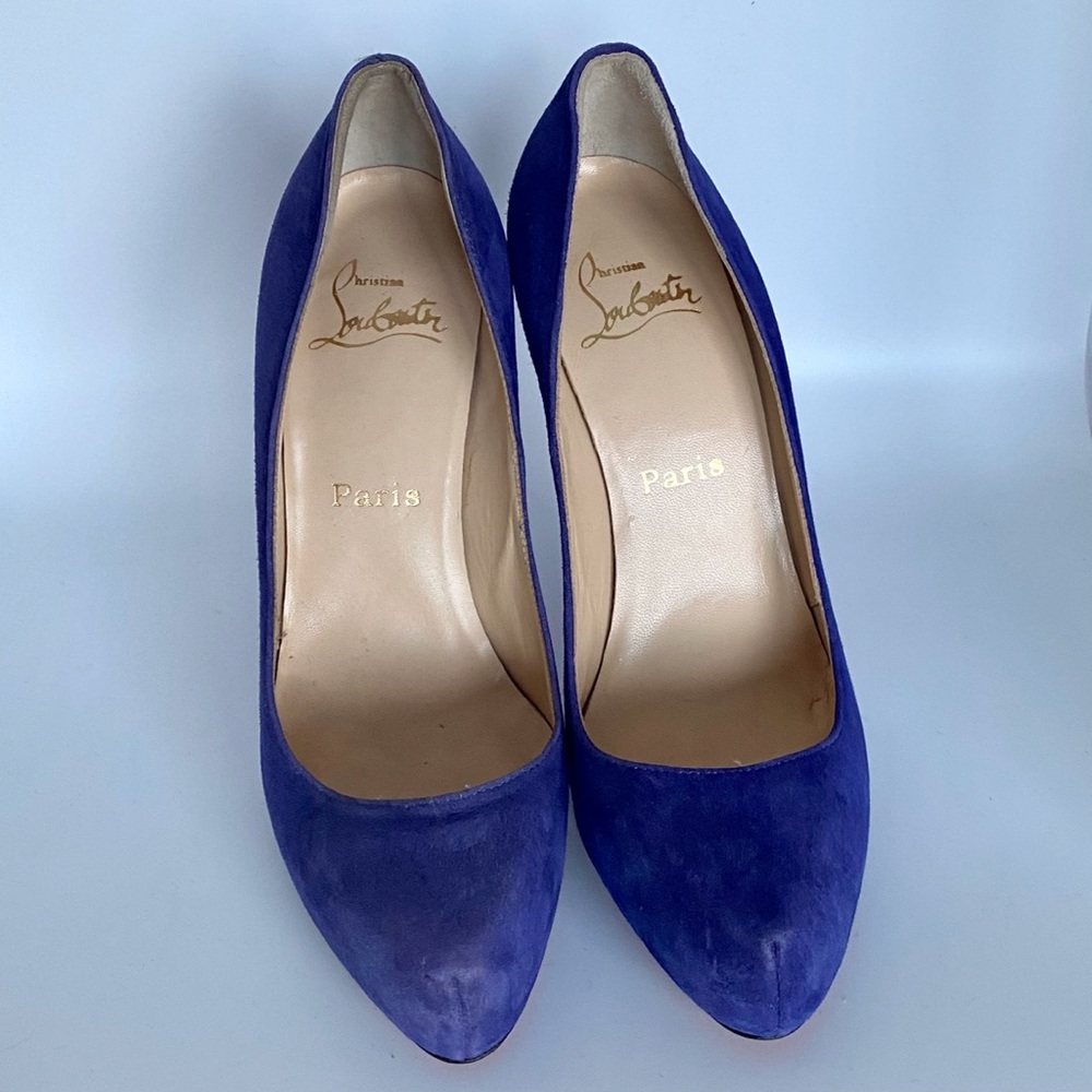 Christian Louboutin Suede Purple Pumps.
